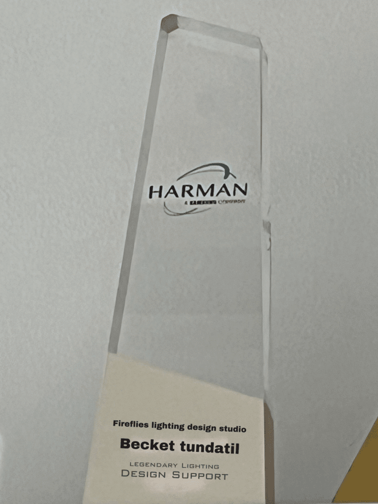 Fireflies Lighting Design receiving Legendary Lighting Support Award at PALM Expo 2025